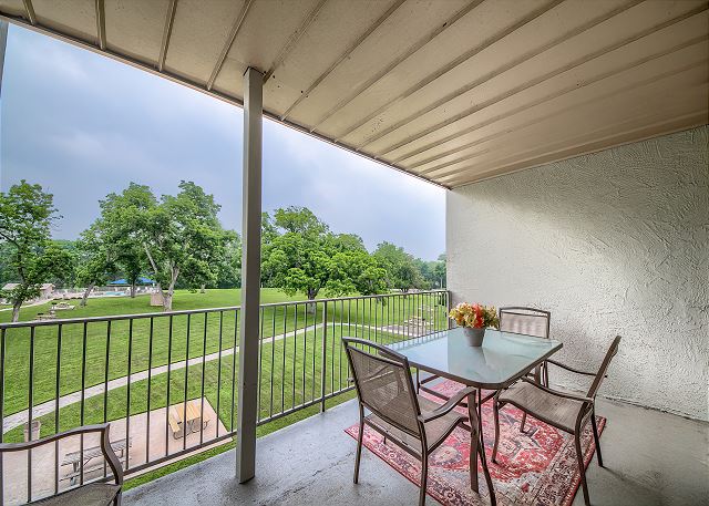 Back patio overlooking the beautiful grounds at Water Wheel Condos! 