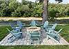 Rock pad by the river with seating and firepit