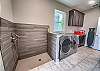 Laundry room with dog washing station
