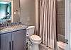 In-suite full bath attached to second master
