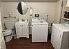 half bath and laundry room lower level.