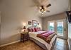 Master Bathroom with a King Sized bed, private patio entrance and an ensuite bathroom! 