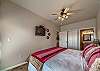 Master Bathroom with a King Sized bed, private patio entrance and an ensuite bathroom! 
