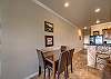 Dining room table has seating for 4 while the breakfast bar has seating for 3! 