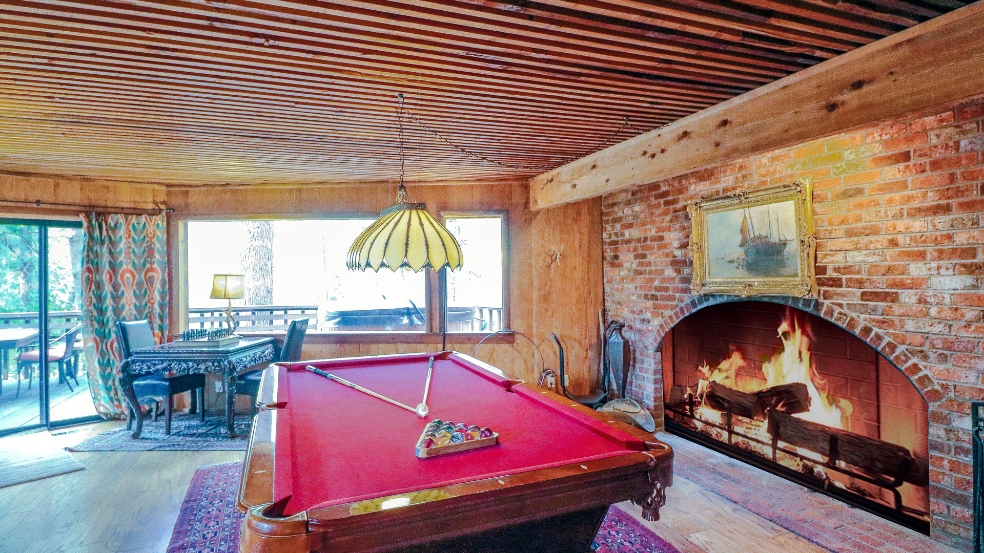 Game room with pool table.-Original