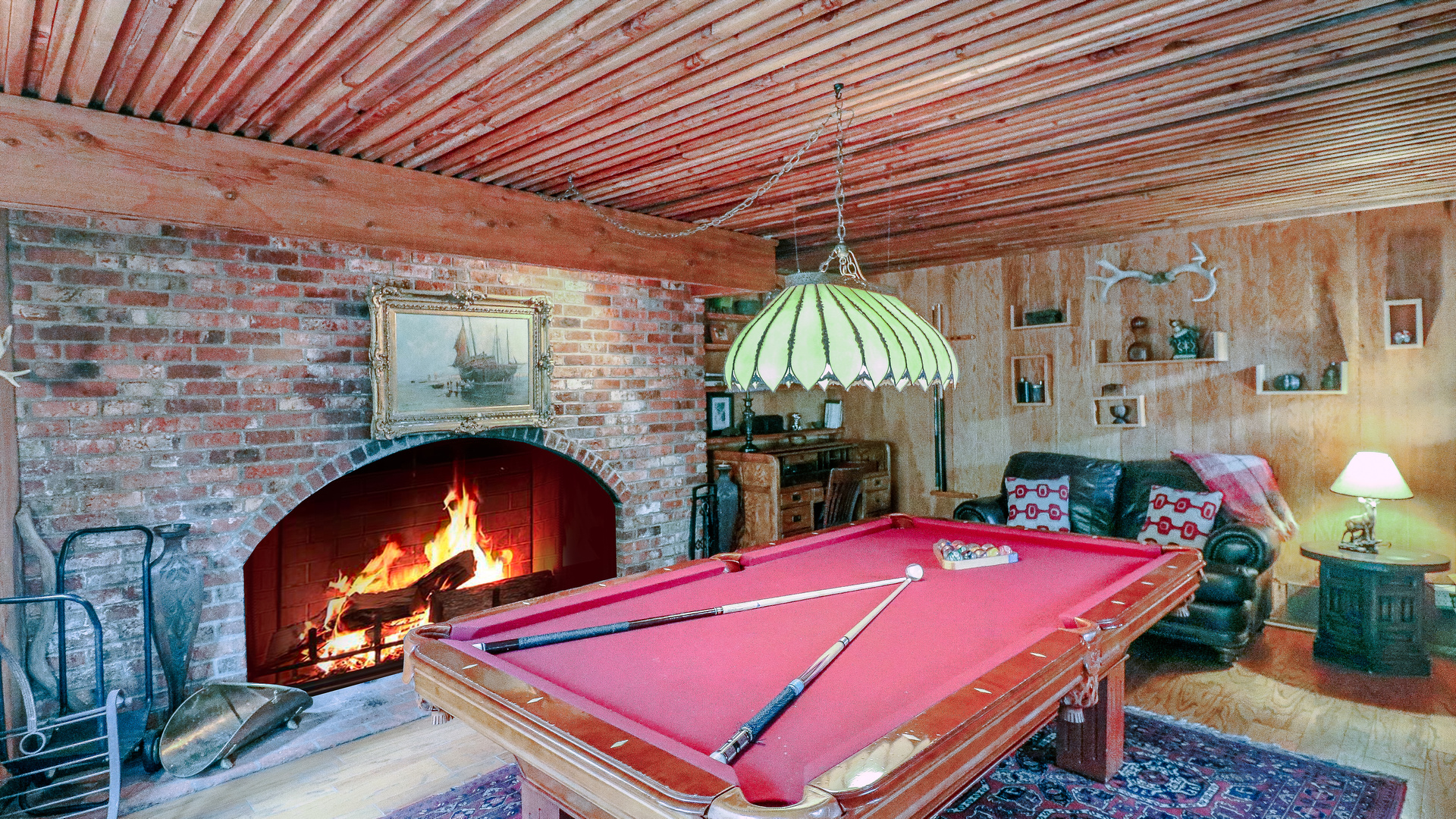 Game room with pool table.-Original