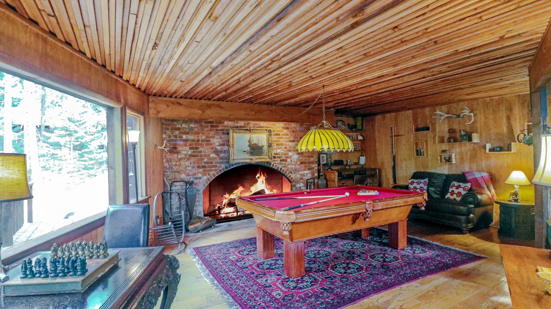 Game room with pool table and chess set.-Original