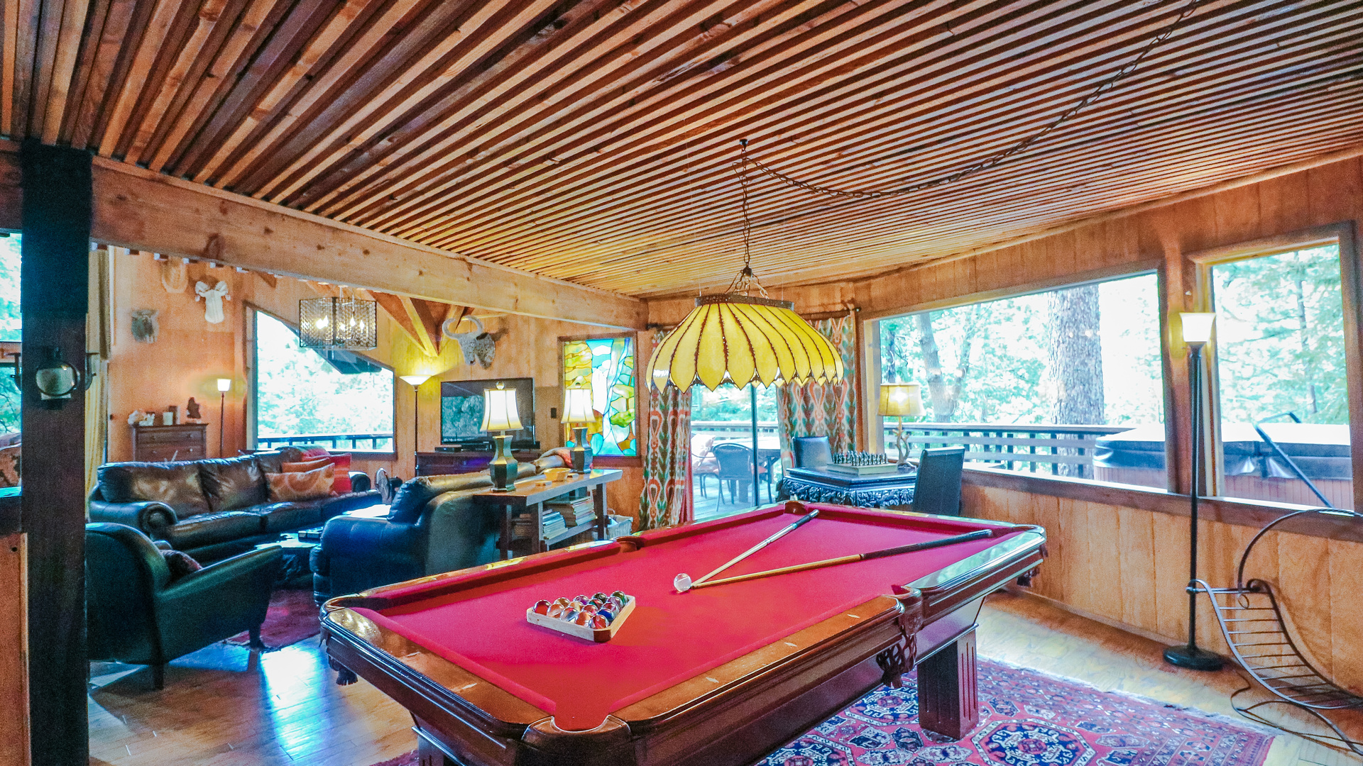 Game room with pool table.-Original