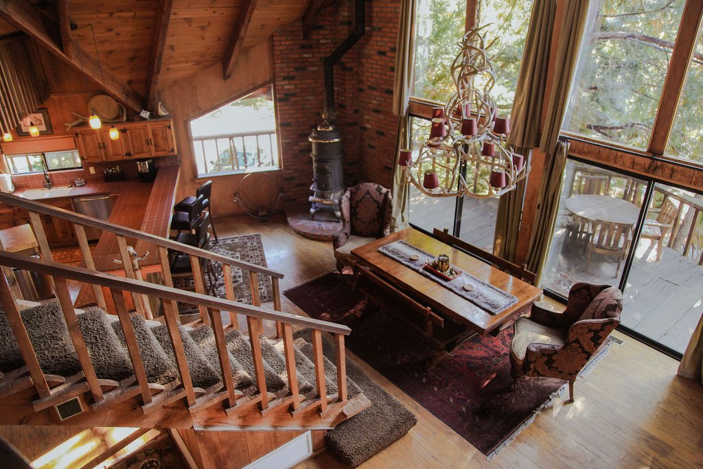 Dining room with seating for 8 and pot belly stove.-Original