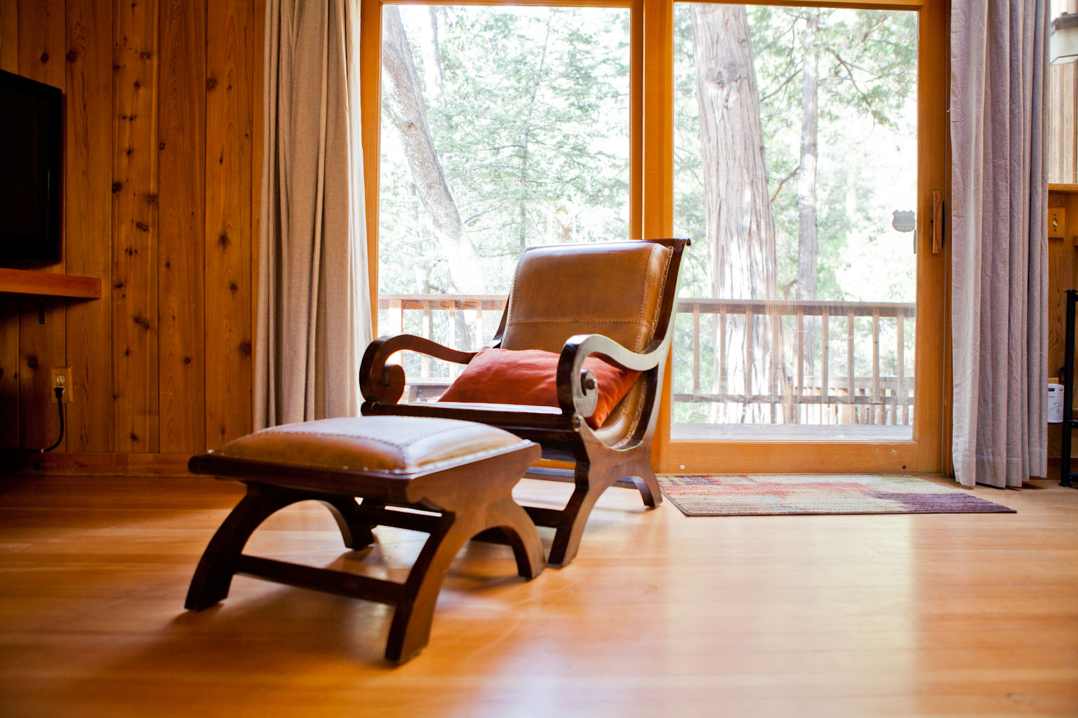 Living room view of the rear deck and creek.-Original