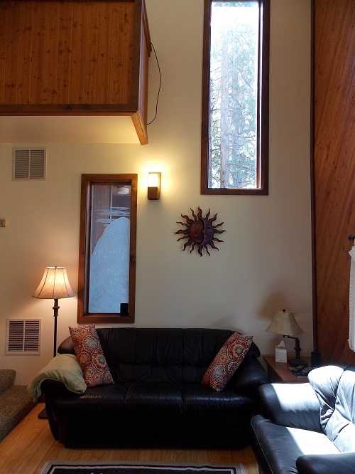 Living room with detailed stenciled window of Lily Rock-Original