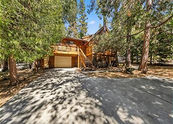 Home has plenty of parking, up to 4 cars, and home is nestled in