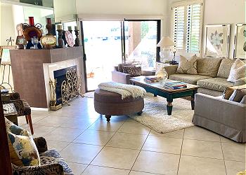 Nicely decorated living room with flat screen tv