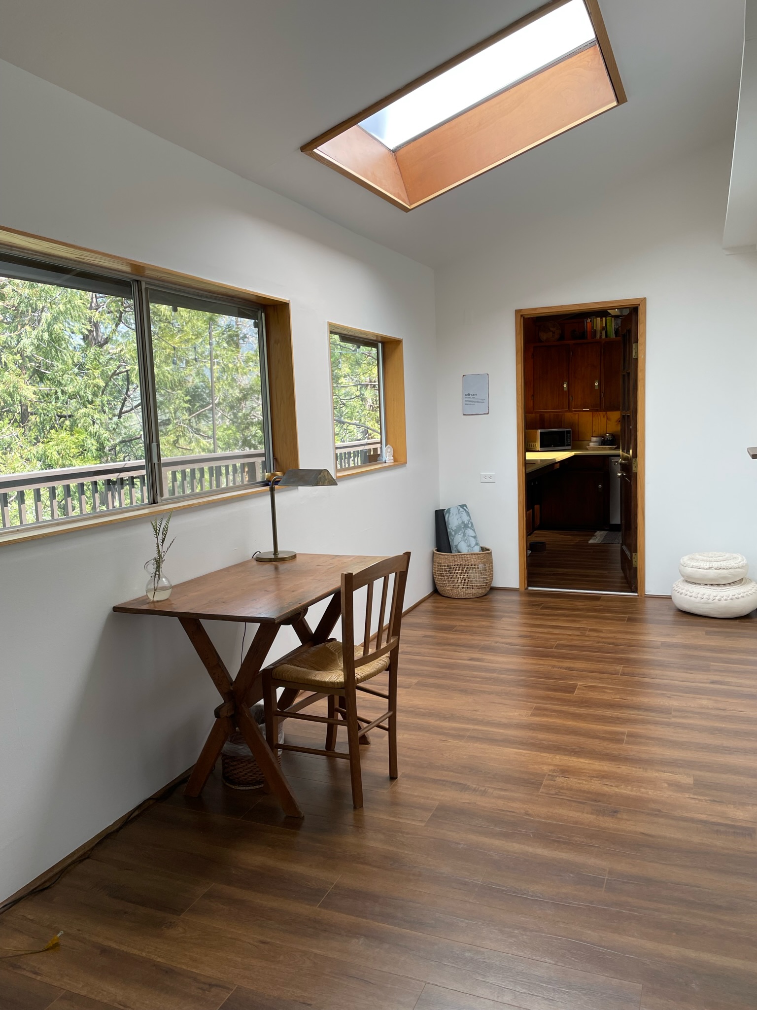 Writing desk available with lots of natural light that shines in-Original