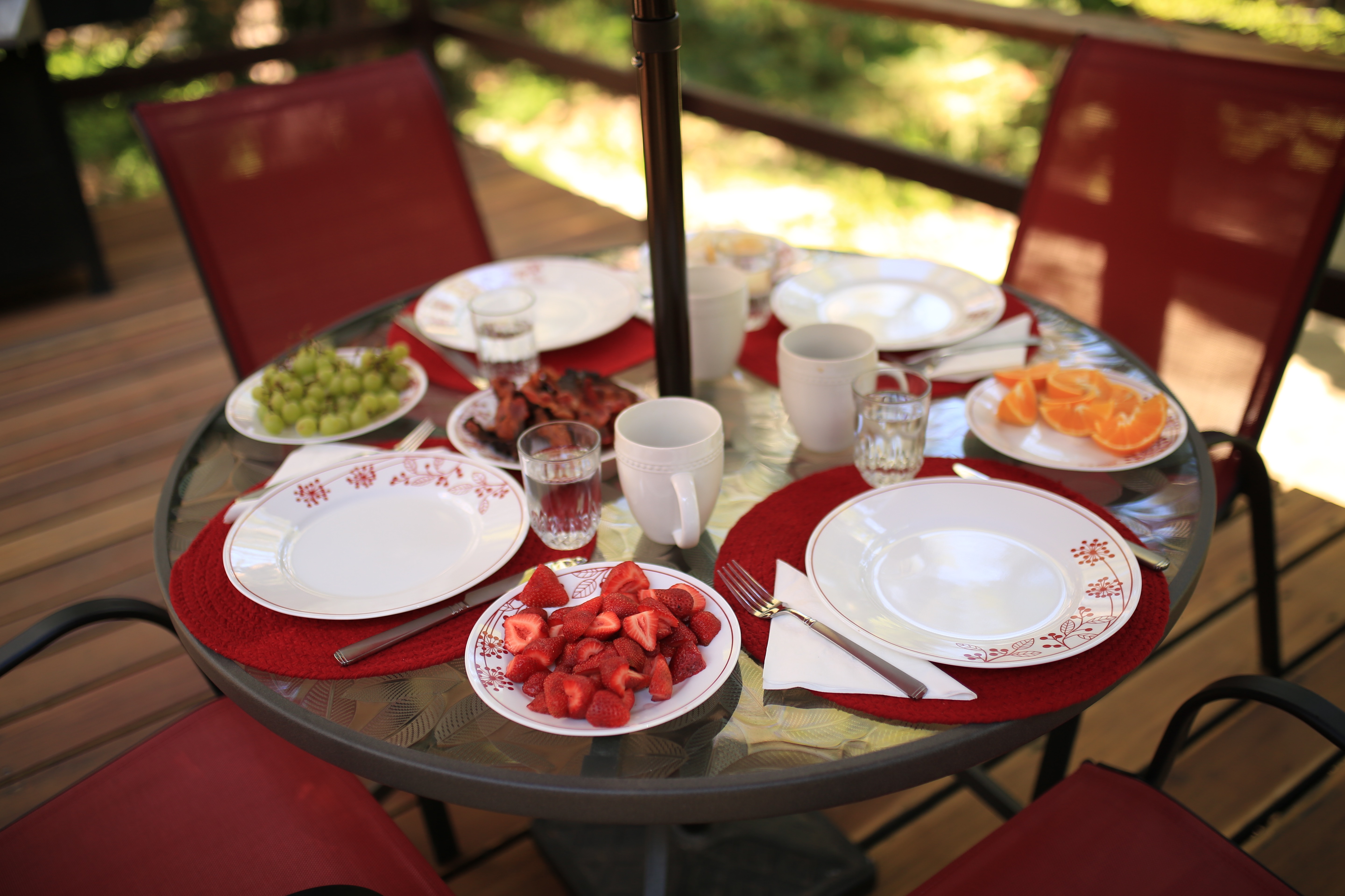 Deck dining table perfect for a summer lunch.-Original