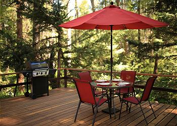 Deck has a BBQ and patio seating, perfect for nice weather.