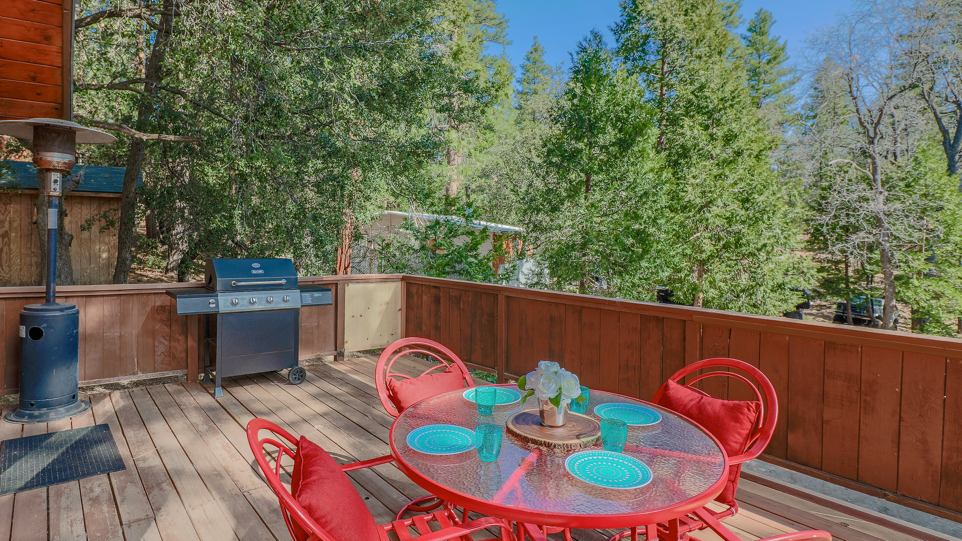 Deck has outdoor seating and BBQ and beautiful tree views.-Original