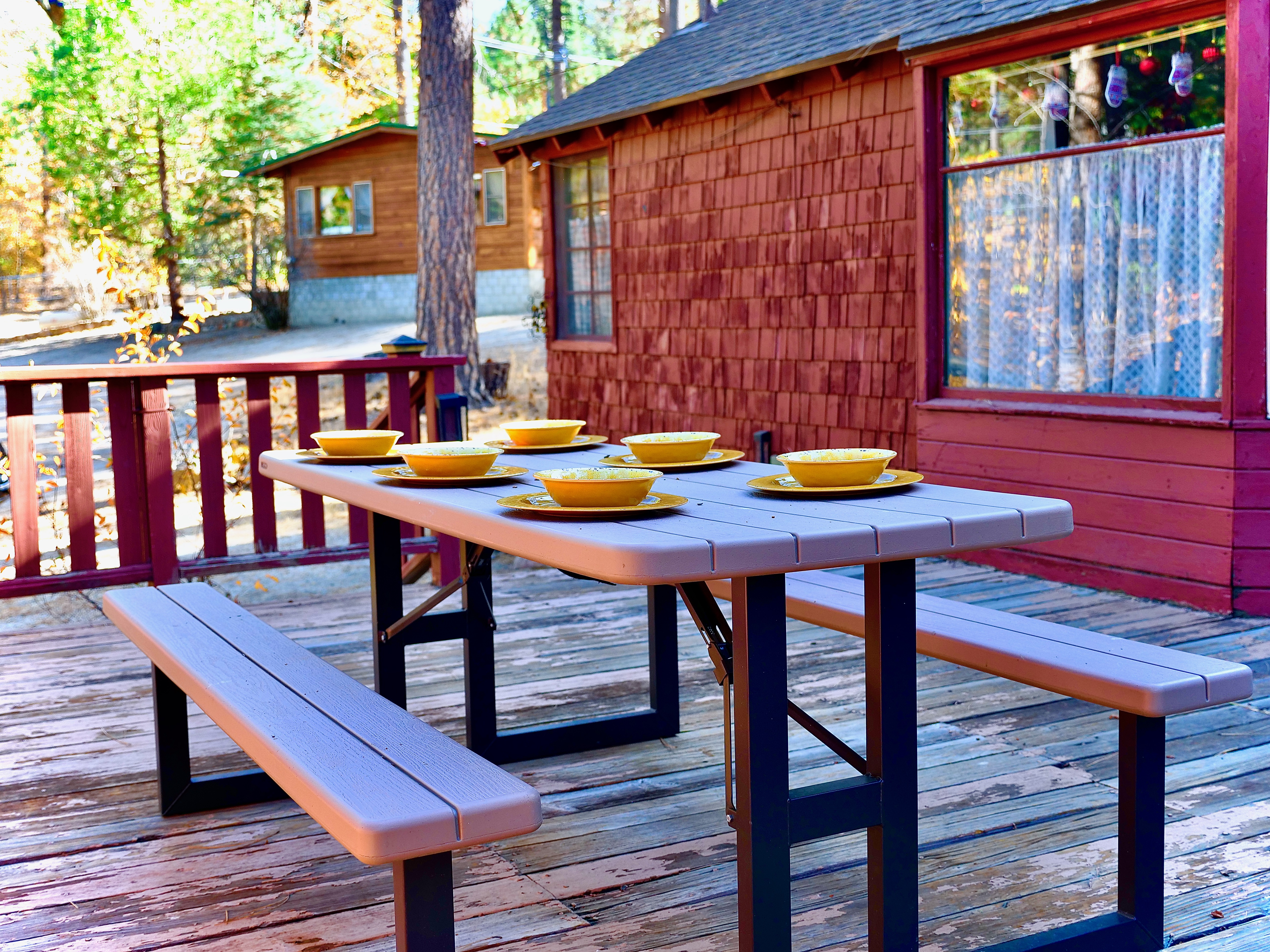 Enjoy dinner outside on the home's deck.-Original