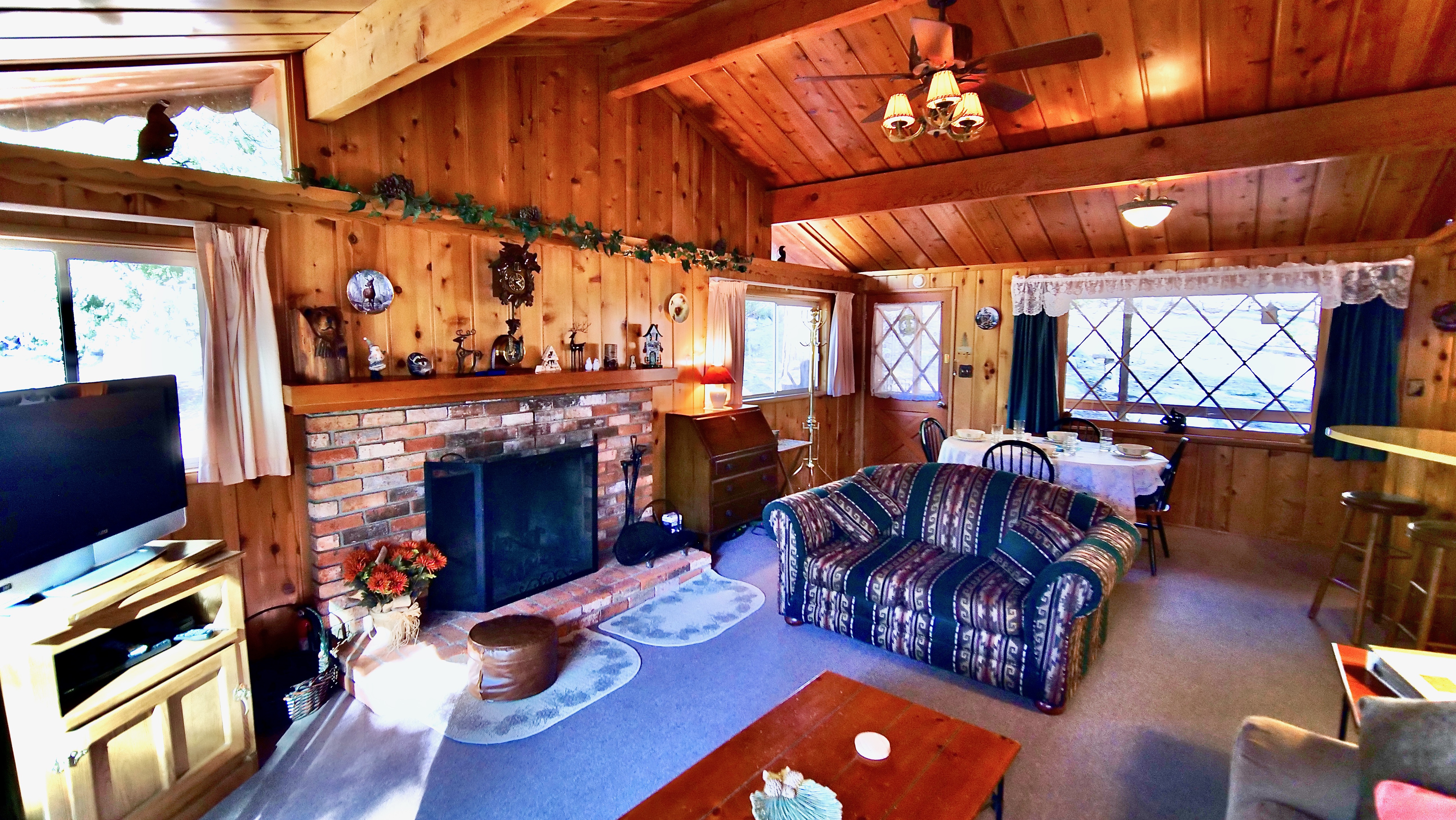 Living room with TV and fireplace.-Original