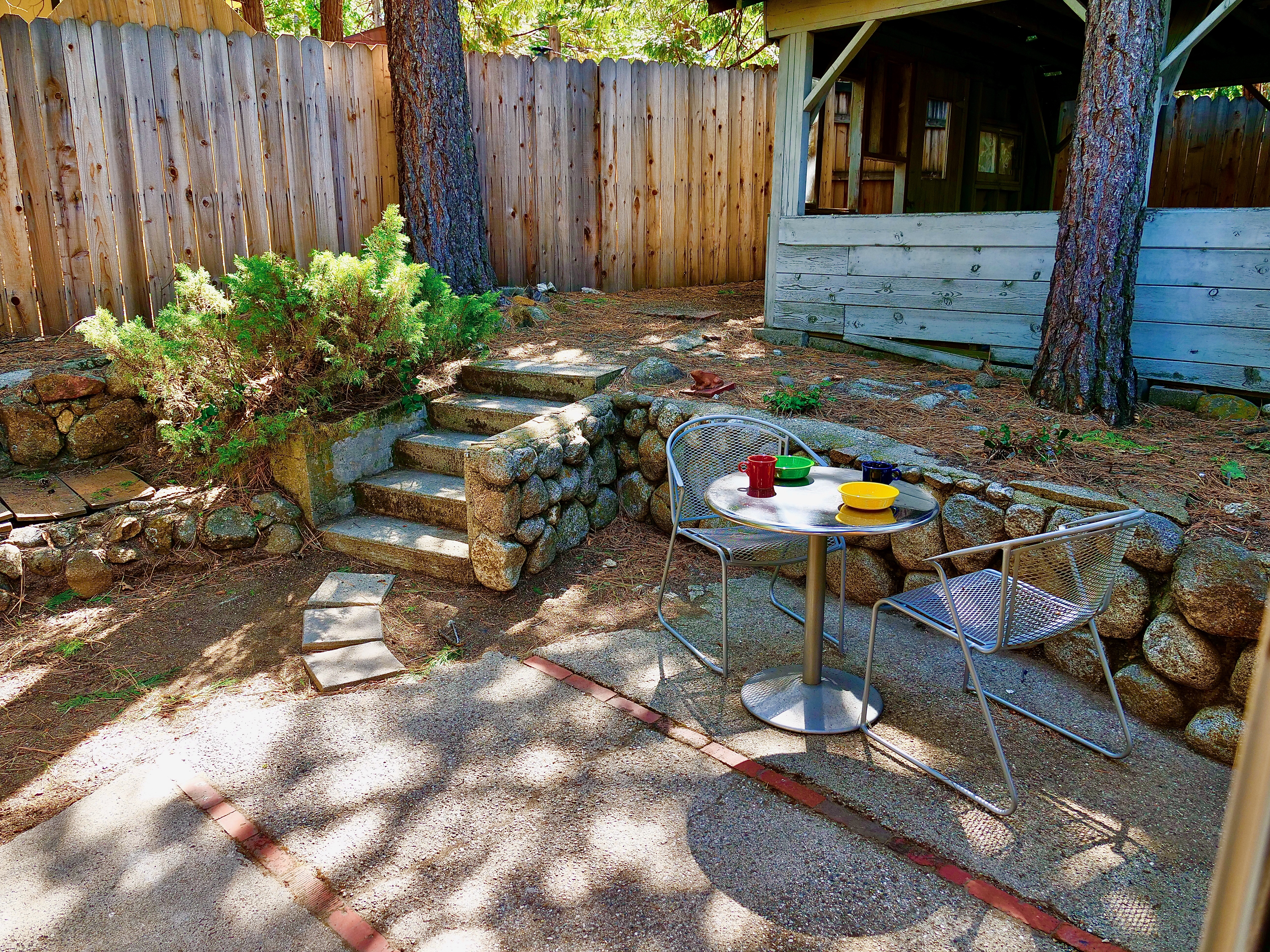 Backyard has outdoor seating.-Original