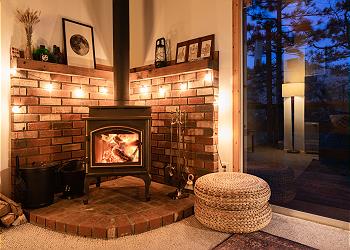 Cozy up by the warm wood burning fireplace at Scout's Hideaway!