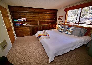Master bedroom with king sized bed.