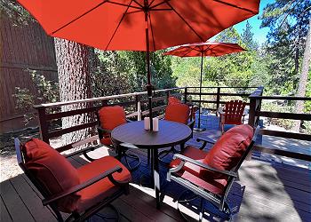 Soak in panoramic views from the spacious deck, featuring an out