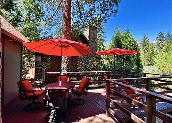 Soak in panoramic views from the spacious deck, featuring an out
