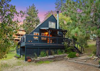 This beautiful Chalet is nestled in the pines.
