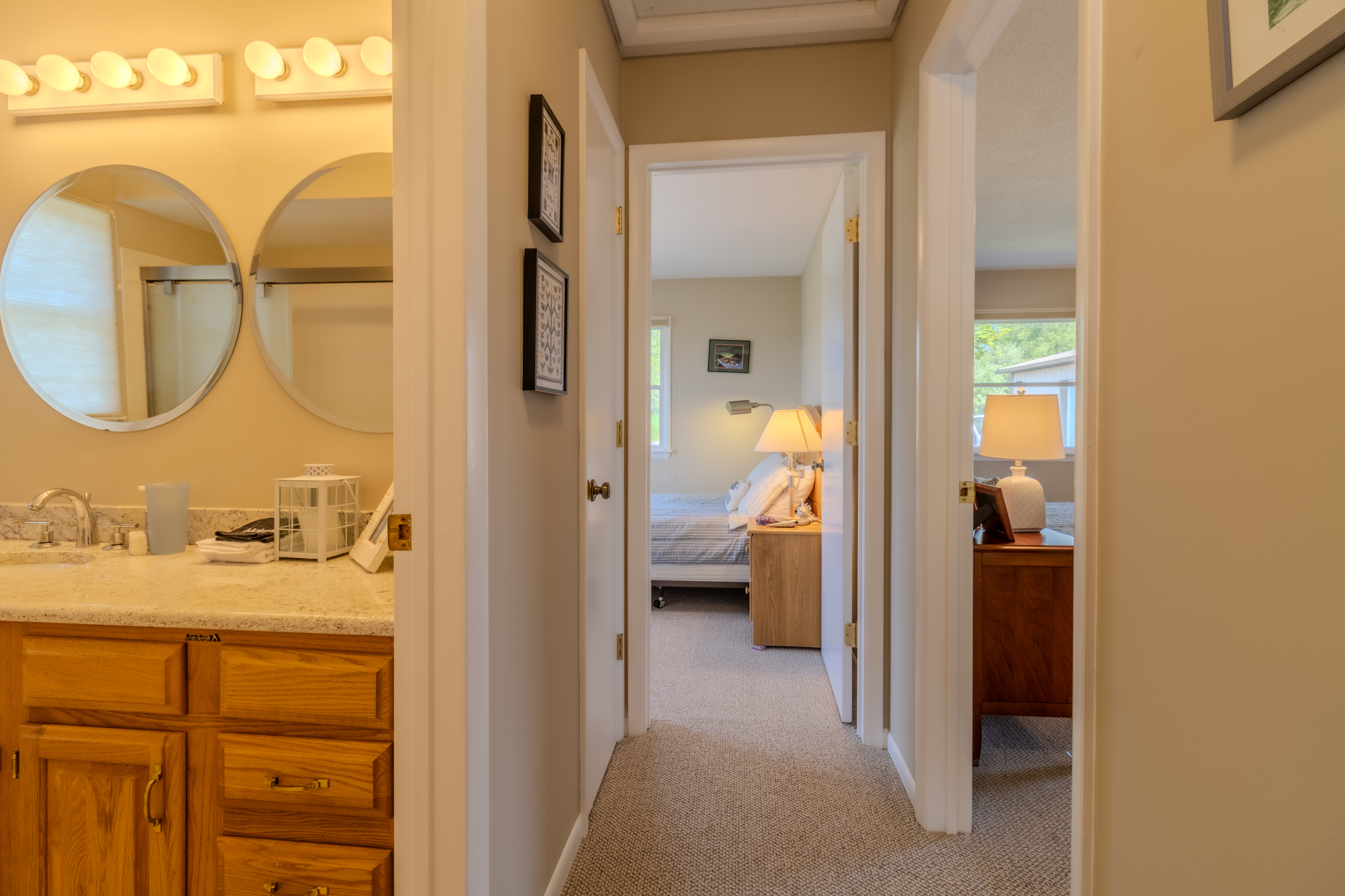 Hallway looking from primary bedroom to the other bedrooms