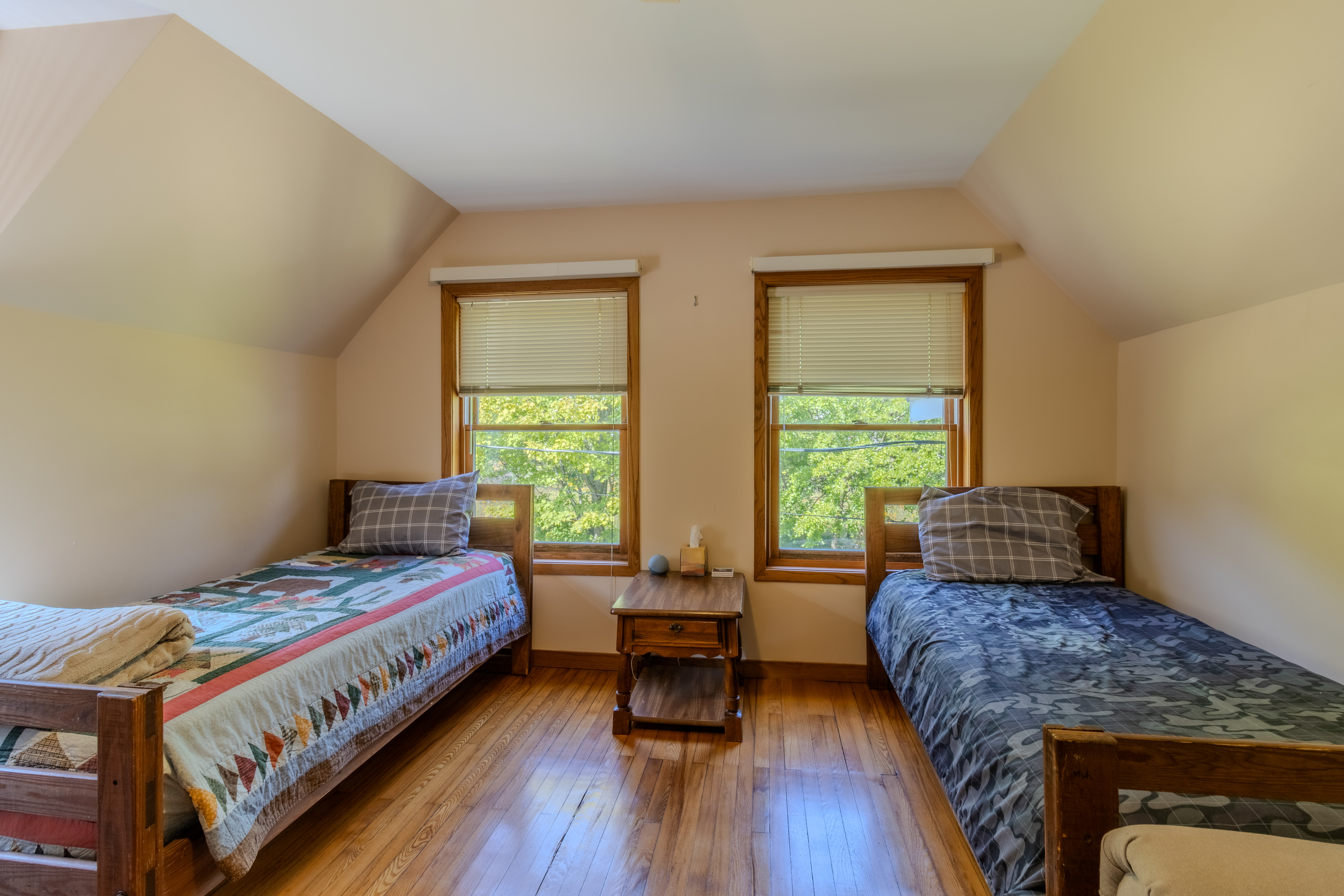 Bedroom 3 (Second Floor): Three twin beds