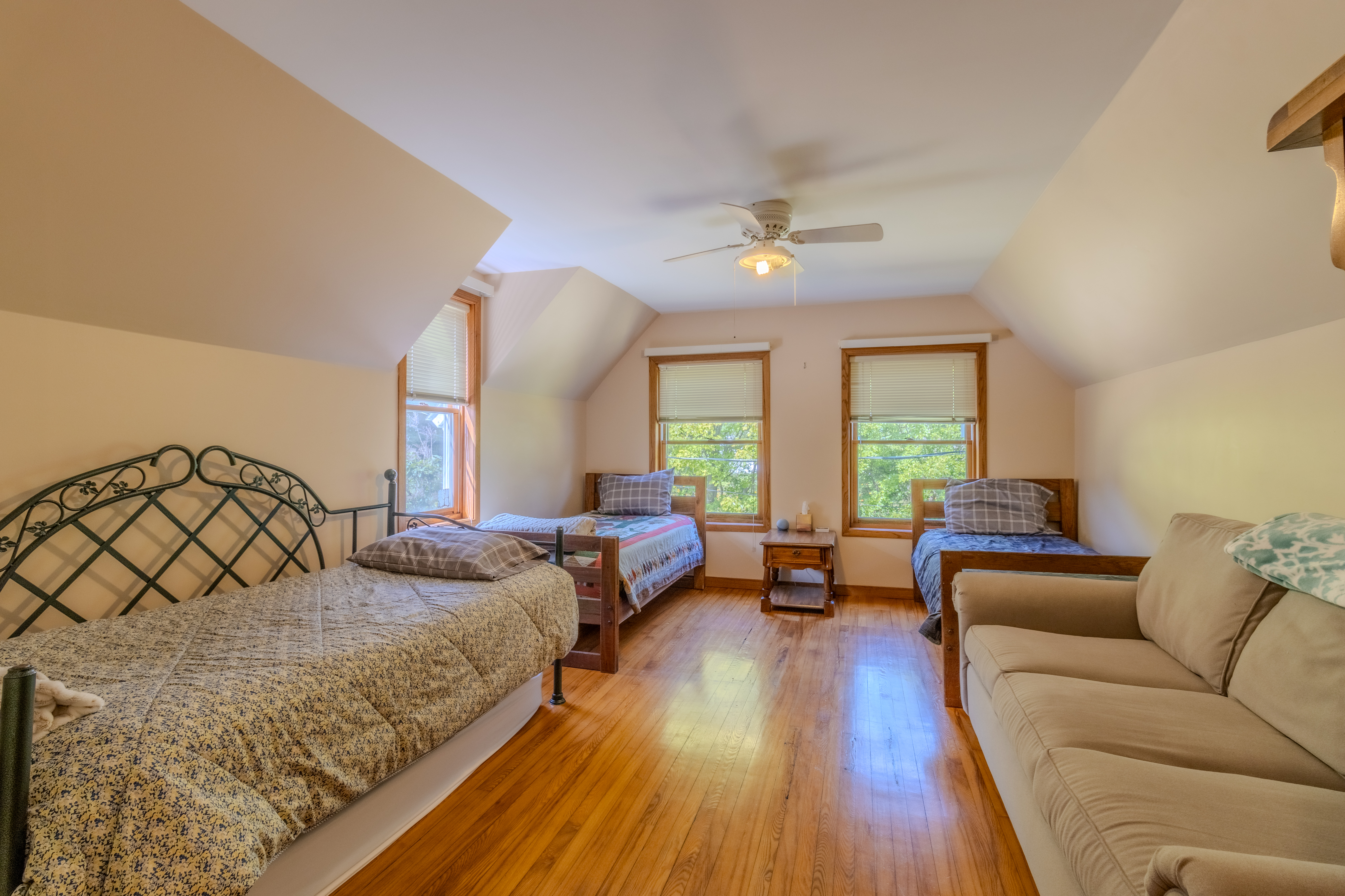 Bedroom 3 (Second Floor): Three twin beds