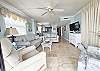 Crescent Sands L5 oceanfront living area with new couch and loveseat. 