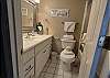 Private full size bathroom attached to the twin bedroom with shower/tub combo