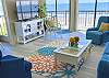 Direct oceanfront living area with balcony access