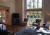 Living area with floor to ceiling window Living area with floor to ceiling window