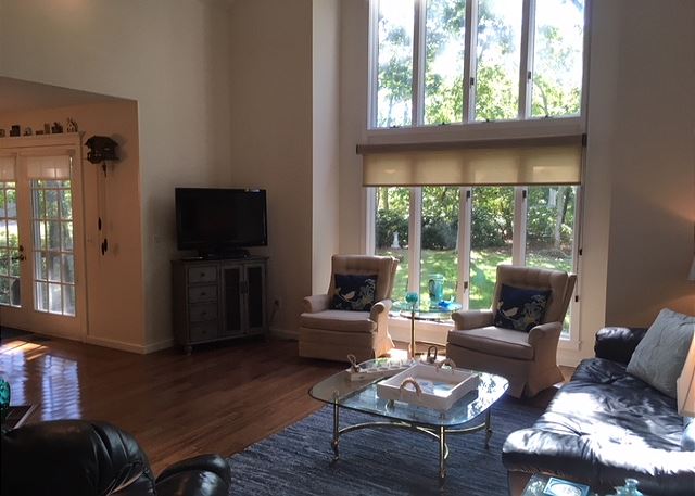 Living area with floor to ceiling window Living area with floor to ceiling window