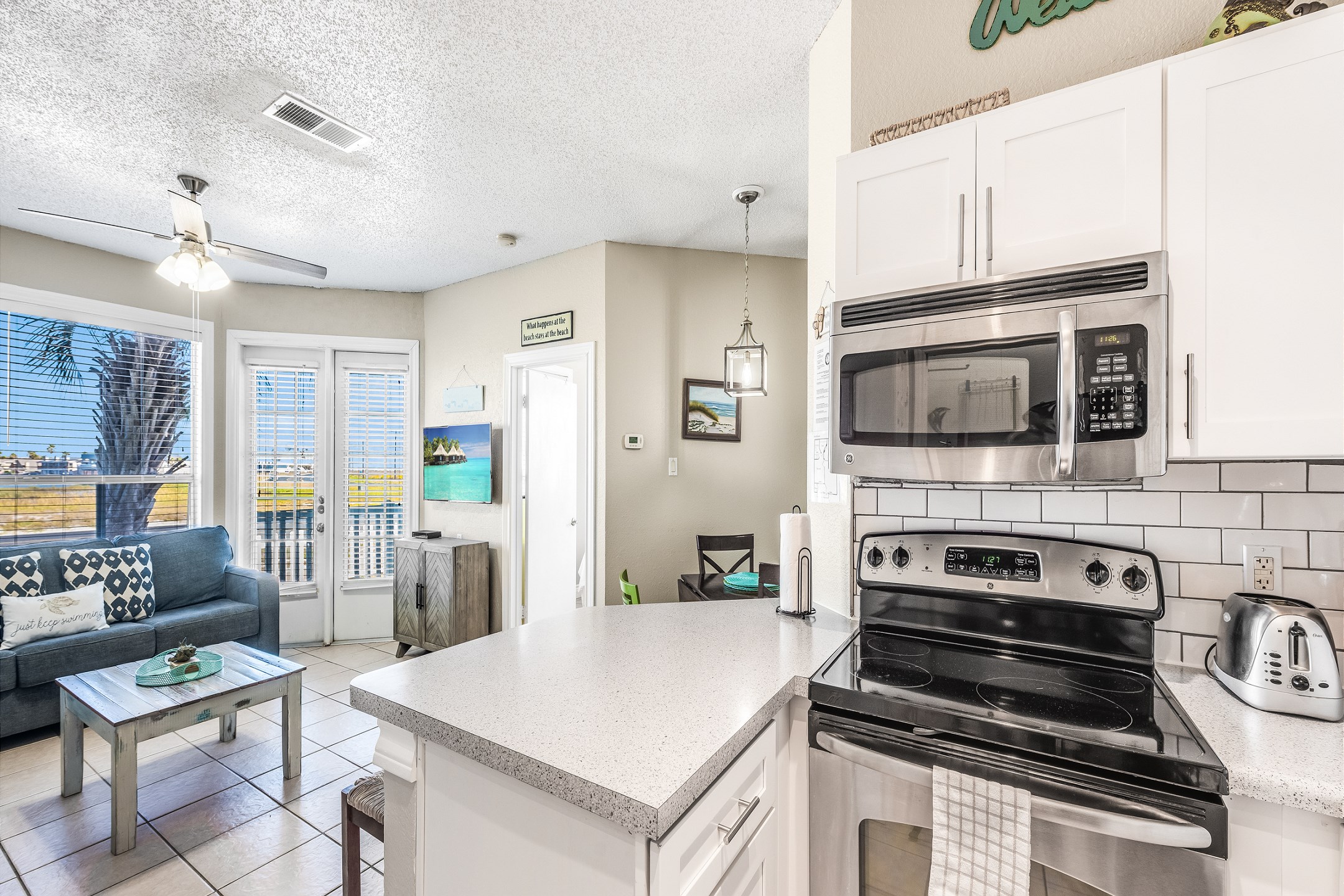 Open-concept layout connecting the dining area to the kitchen
