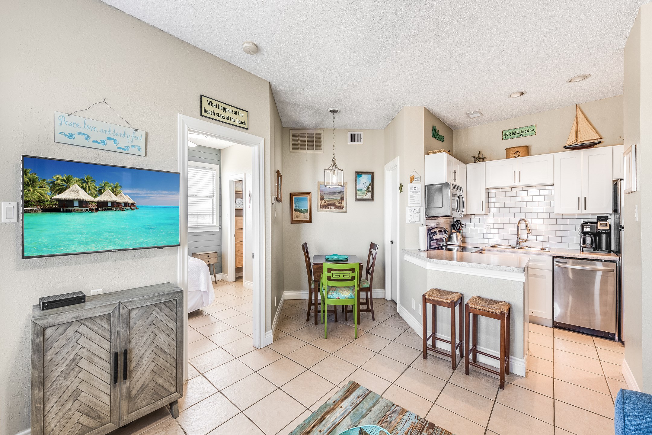 Relaxed coastal living with easy access from kitchen to living and dining