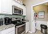 Fully equipped kitchen with updated counter tops and stainless steel appliances 