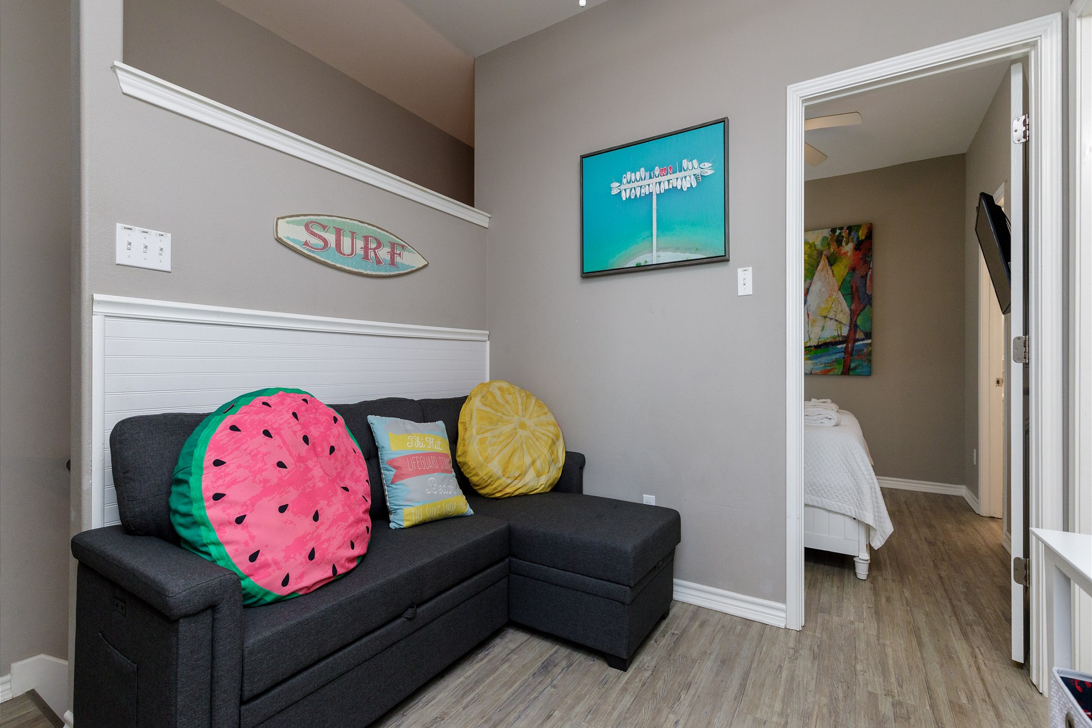 Cozy corner between the 3 bedrooms on the second floor. Includes a sleeper sofa for additional guests