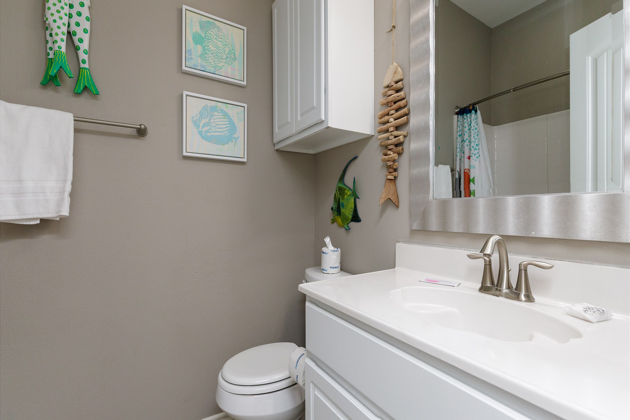 Guest bathroom on the second floor with tub and shower combo