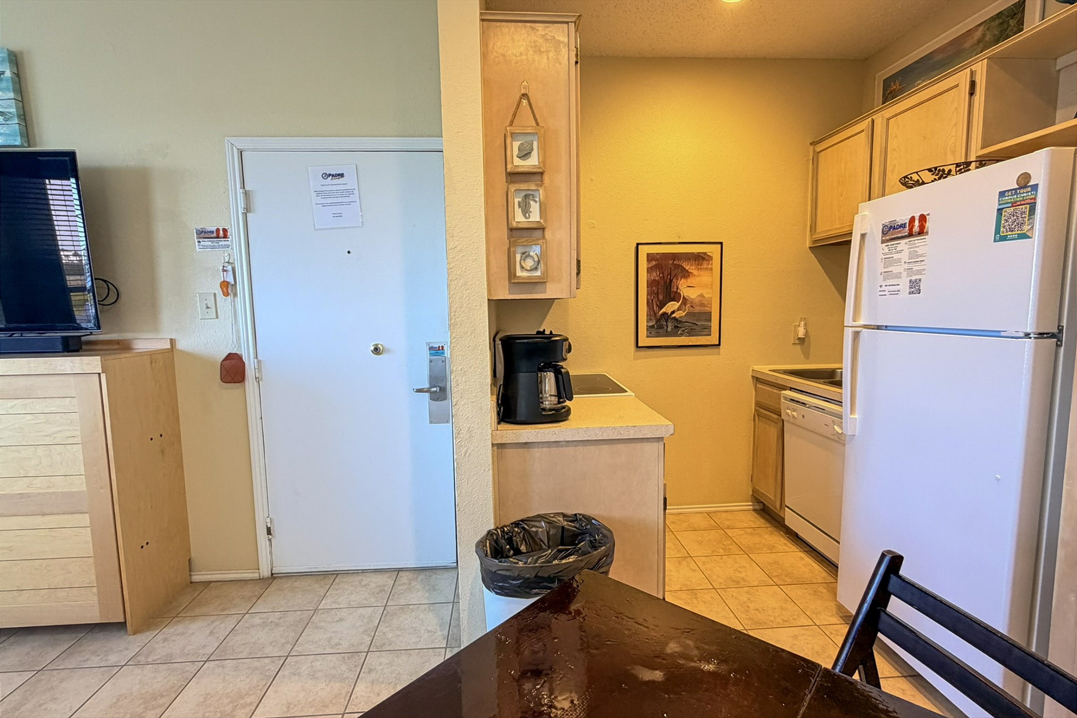 Experience culinary charm in this cozy kitchen, where efficiency meets elegance