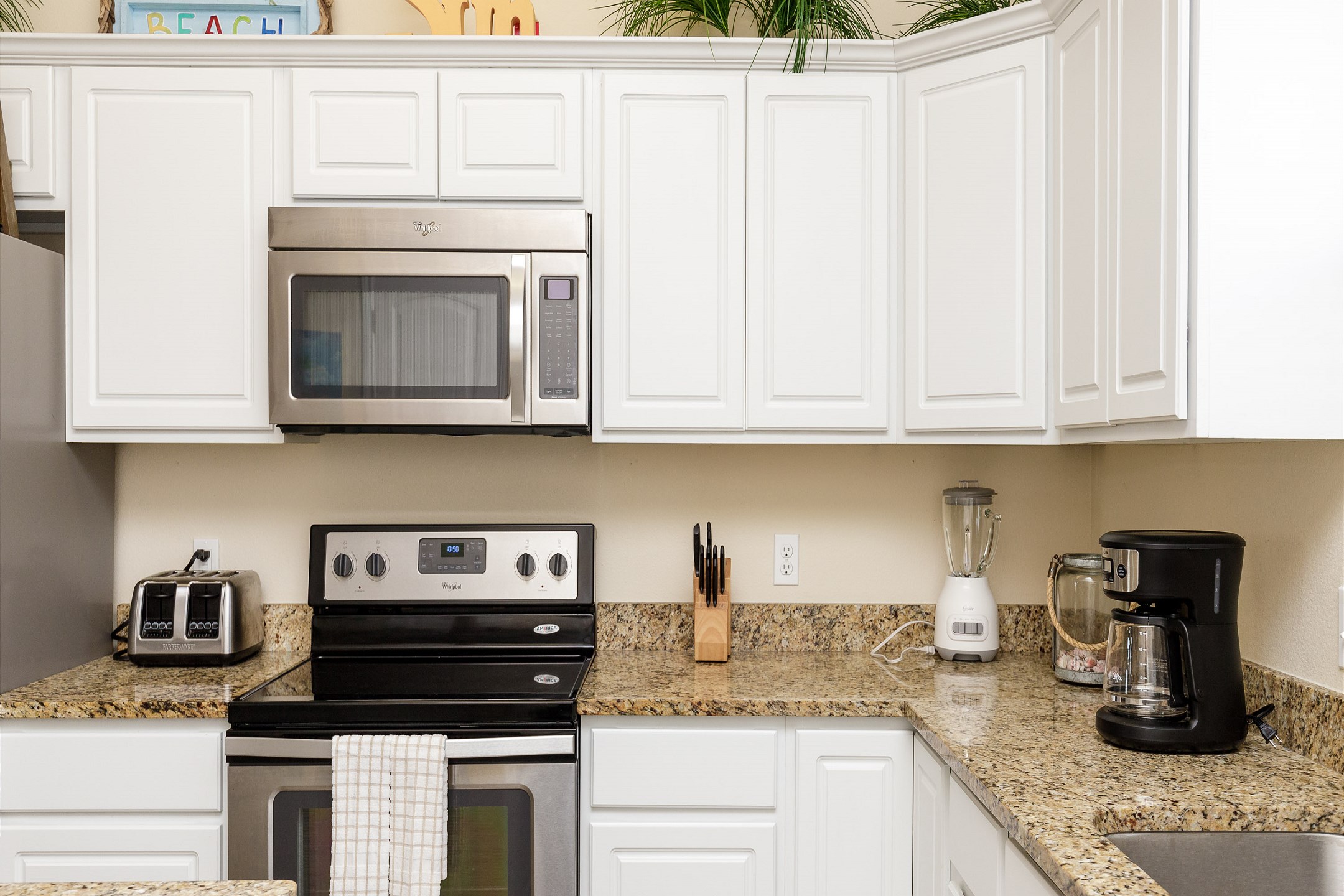 Coffee maker, toaster, and other essentials provided for your convenience