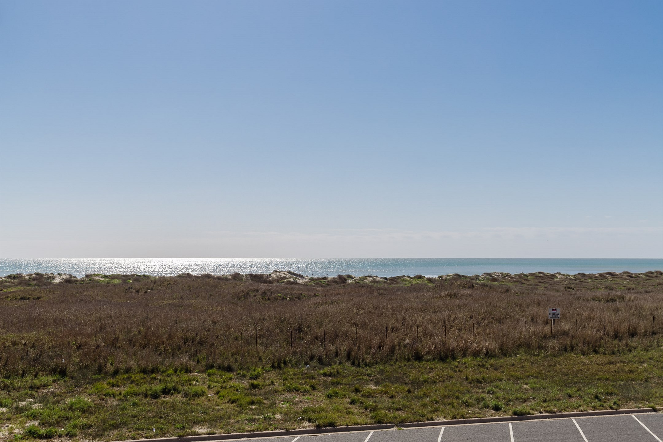 Lovely beach view from the balcony off the primary bedroom