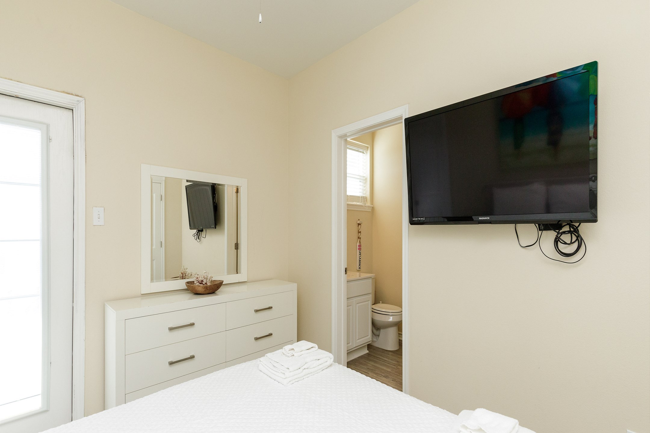 On the second floor you''ll find the primary bedroom with a queen size bad, ensuite bathroom, and private patio with an amazing view