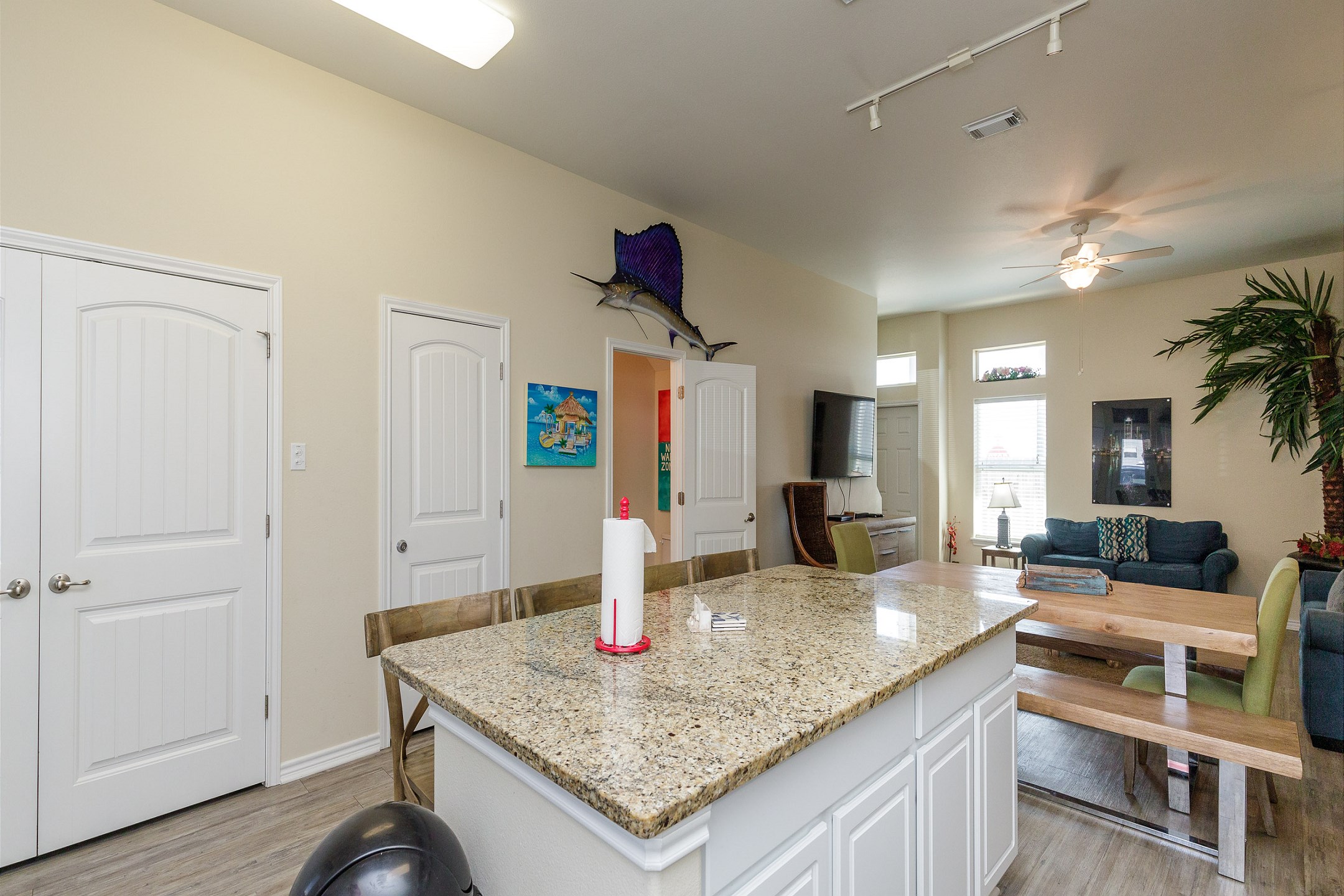 Open-concept layout connecting the dining area to the kitchen