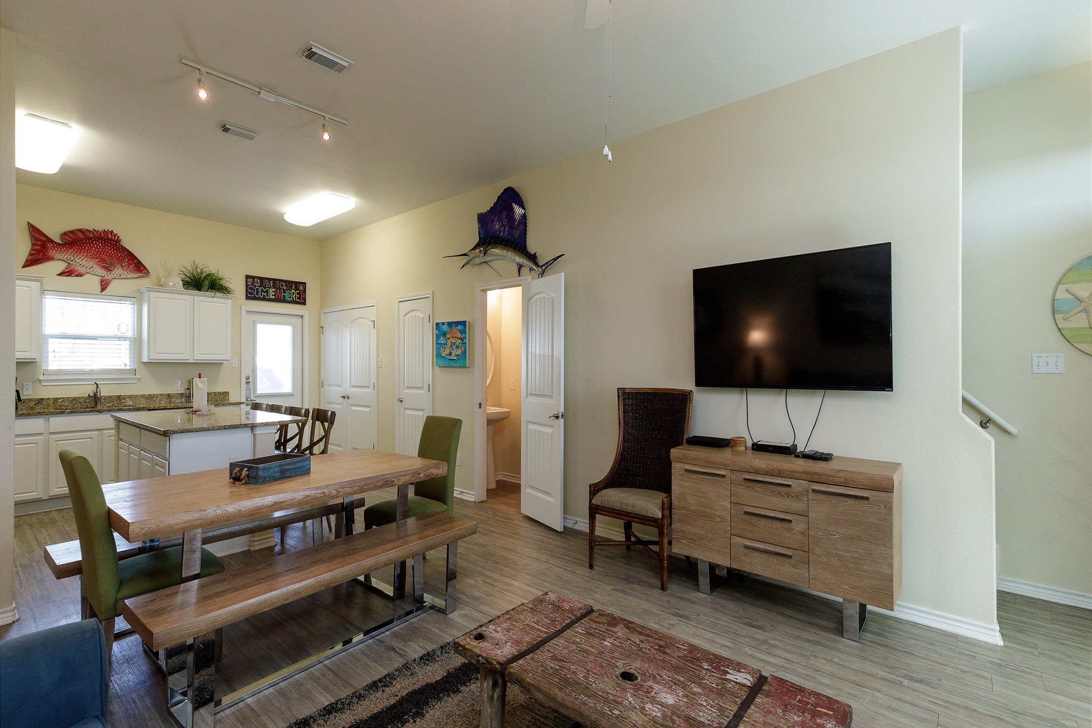 The first floor is an open concept living space that includes, the kitchen, dining, & living area. All 3 bedrooms are upstairs.