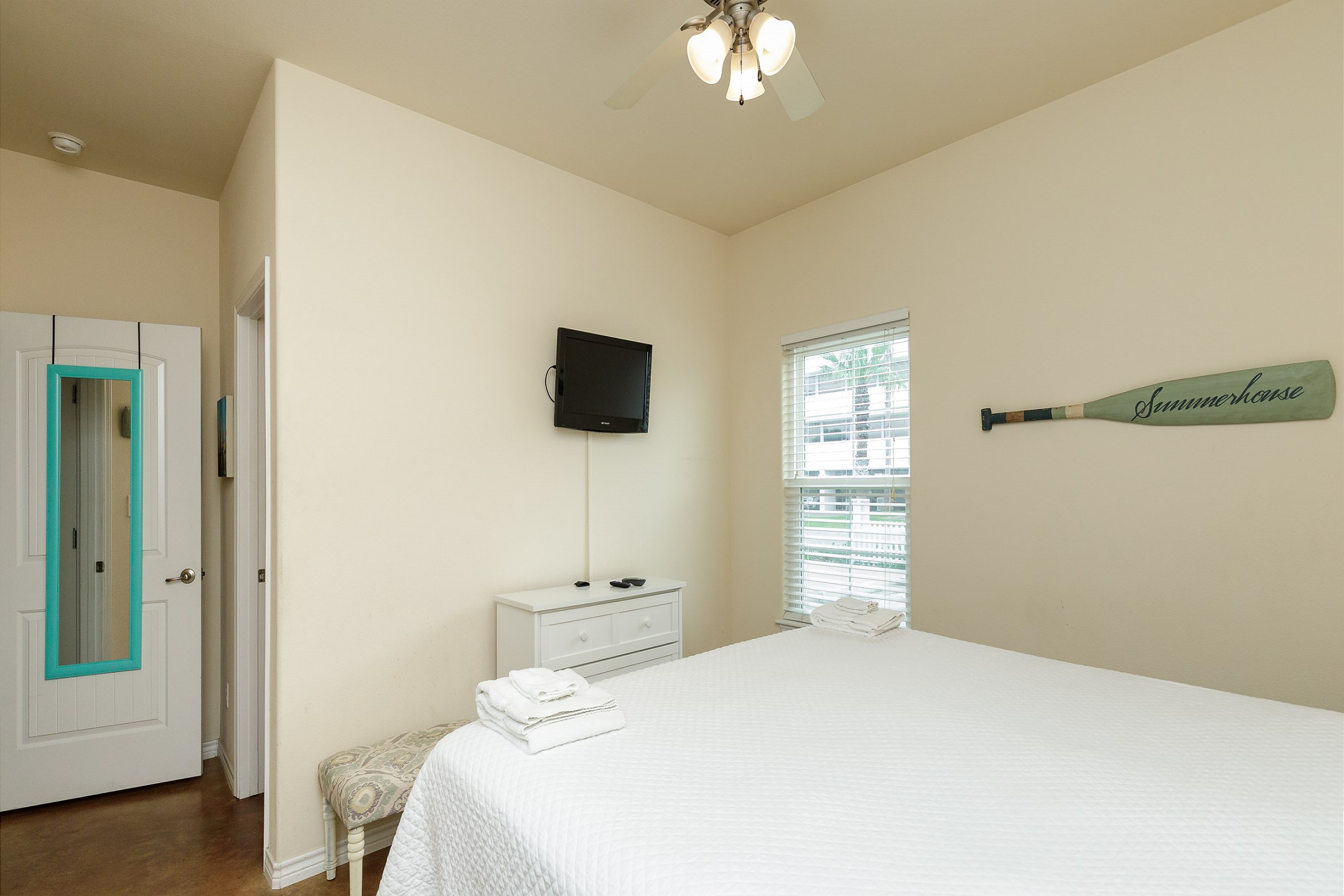 Master bedroom with king size bed, private bathroom and TV