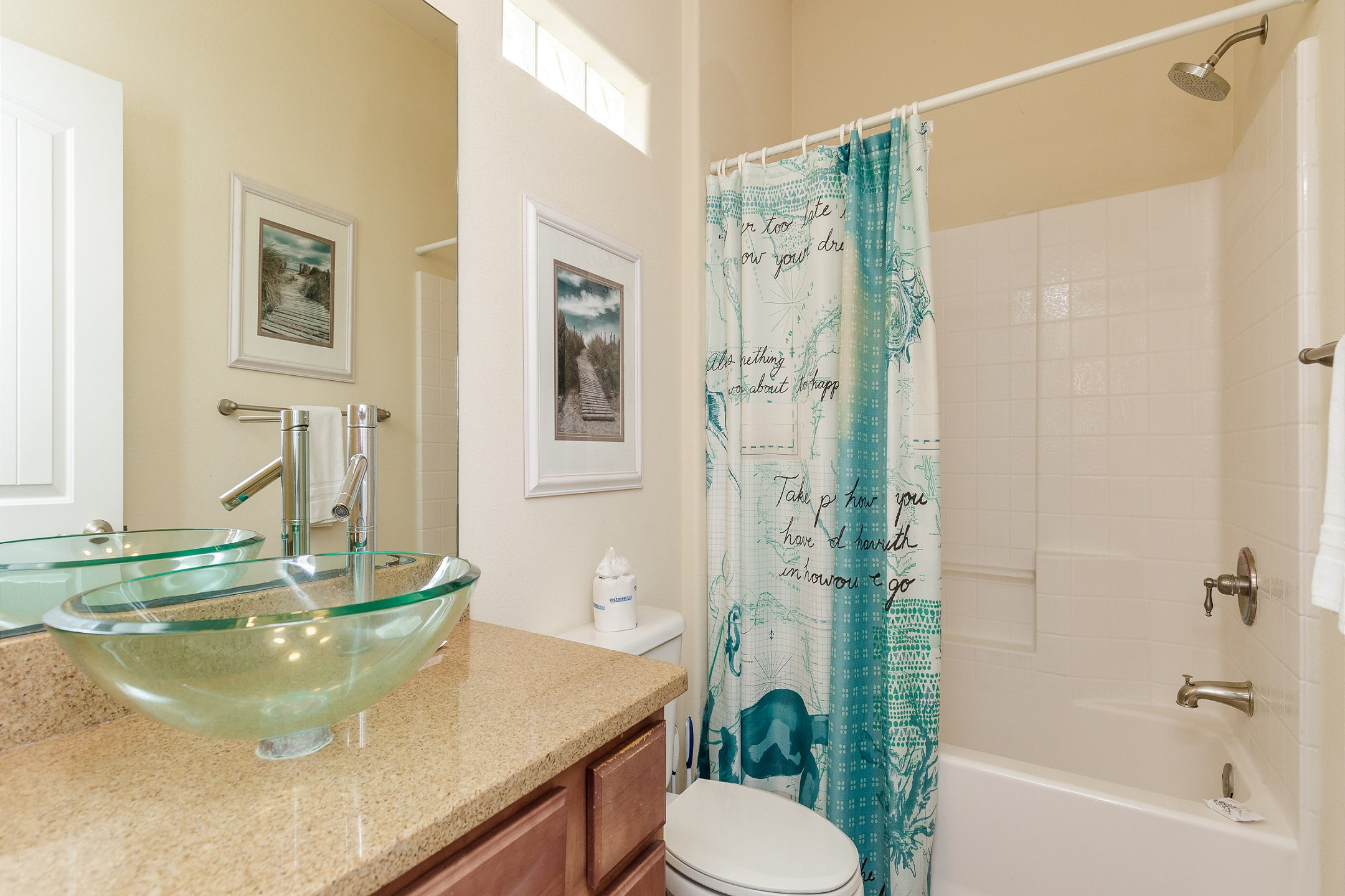Primary bathroom with tub and shower combo